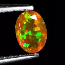 Opal ognisty kamień naturalny AAA 065ct Biżuteria i zegarki